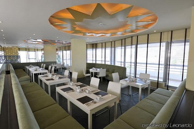 Al Raya Suites Hotel Manamah Restaurant foto